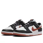 Nike Dunk Low Retro Dragon Red nízke streetové tenisky čierne-červené — produktová fotografia na bielom pozadí, bočný pohľad