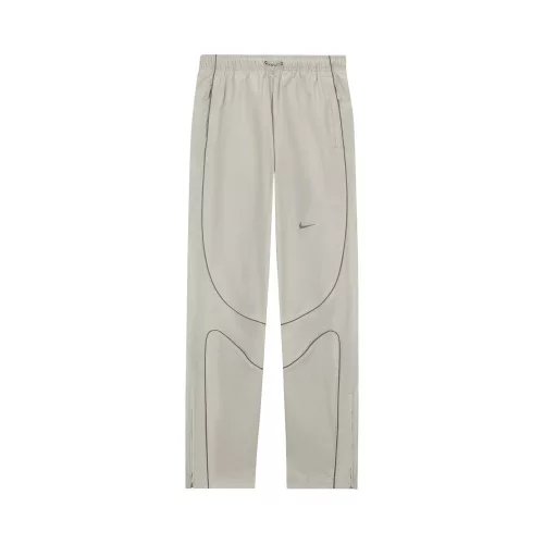 Corteiz x Nike NRG Pant Off White nohavice sivé-lomené biele — produktová fotografia na bielom pozadí, bočný pohľad