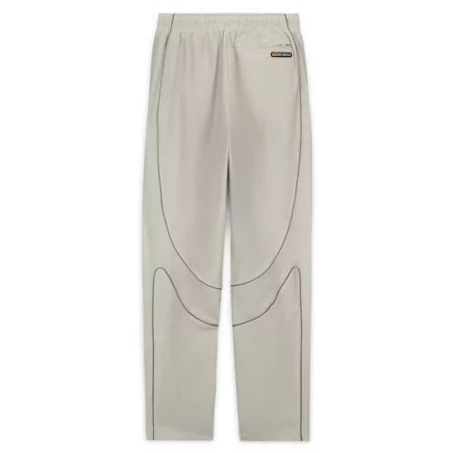 Corteiz x Nike NRG Pant Off White nohavice sivé-lomené biele — produktová fotografia na bielom pozadí, bočný pohľad