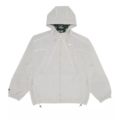 Nike x Corteiz Tracksuit Jacket Grey bunda sivá — produktová fotografia na bielom pozadí, bočný pohľad