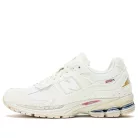 New Balance 2002R Protection Pack Sea Salt nízke streetové tenisky lomené biele — produktová fotografia na bielom pozadí, bočný pohľad