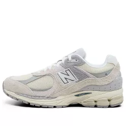 New Balance 2002R Linen nízke streetové tenisky béžové-sivé — produktová fotografia na bielom pozadí, bočný pohľad