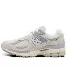 New Balance 2002R Linen nízke streetové tenisky béžové-sivé — produktová fotografia na bielom pozadí, bočný pohľad