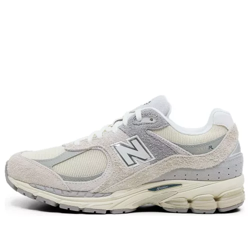 New Balance 2002R Linen nízke streetové tenisky béžové-sivé — produktová fotografia na bielom pozadí, bočný pohľad