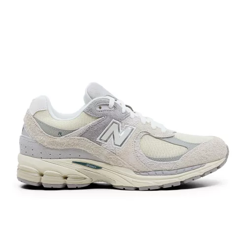 New Balance 2002R Linen nízke streetové tenisky béžové-sivé — produktová fotografia na bielom pozadí, bočný pohľad
