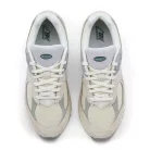 New Balance 2002R Linen nízke streetové tenisky béžové-sivé — produktová fotografia na bielom pozadí, bočný pohľad