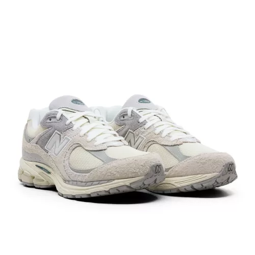 New Balance 2002R Linen nízke streetové tenisky béžové-sivé — produktová fotografia na bielom pozadí, bočný pohľad