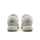 New Balance 2002R Linen nízke streetové tenisky béžové-sivé — produktová fotografia na bielom pozadí, bočný pohľad