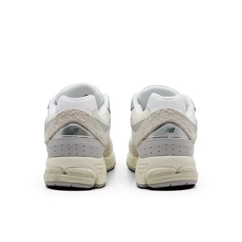 New Balance 2002R Linen nízke streetové tenisky béžové-sivé — produktová fotografia na bielom pozadí, bočný pohľad