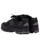 New Balance 2002R Cordura Phantom Black nízke streetové tenisky lomené biele-čierne — produktová fotografia na bielom pozadí, bočný pohľad