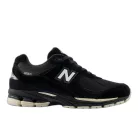 New Balance 2002R Black Oat nízke streetové tenisky čierne — produktová fotografia na bielom pozadí, bočný pohľad