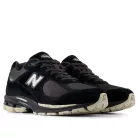 New Balance 2002R Black Oat nízke streetové tenisky čierne — produktová fotografia na bielom pozadí, bočný pohľad
